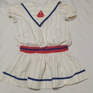 White sailor-style children's vintage dress with blue stripes, 1977